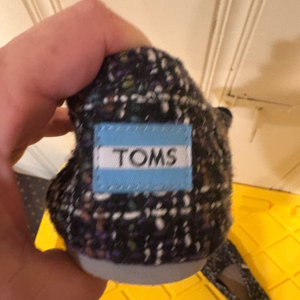 TOMS Black and White Tweed Slip-Ons